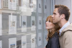 Couple looking at houses IRL