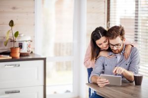 Couple looking online together